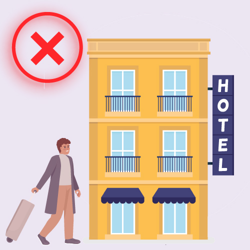 homme en direction d'un hotel